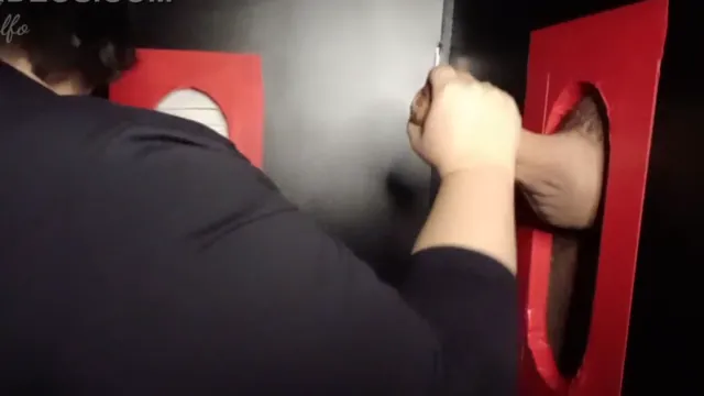 Wife enjoys a stranger's cock at a glory hole until he finishes, frame 5 of 8