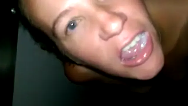 Wife swaps cum through a gloryhole while husband films, frame 7 of 8
